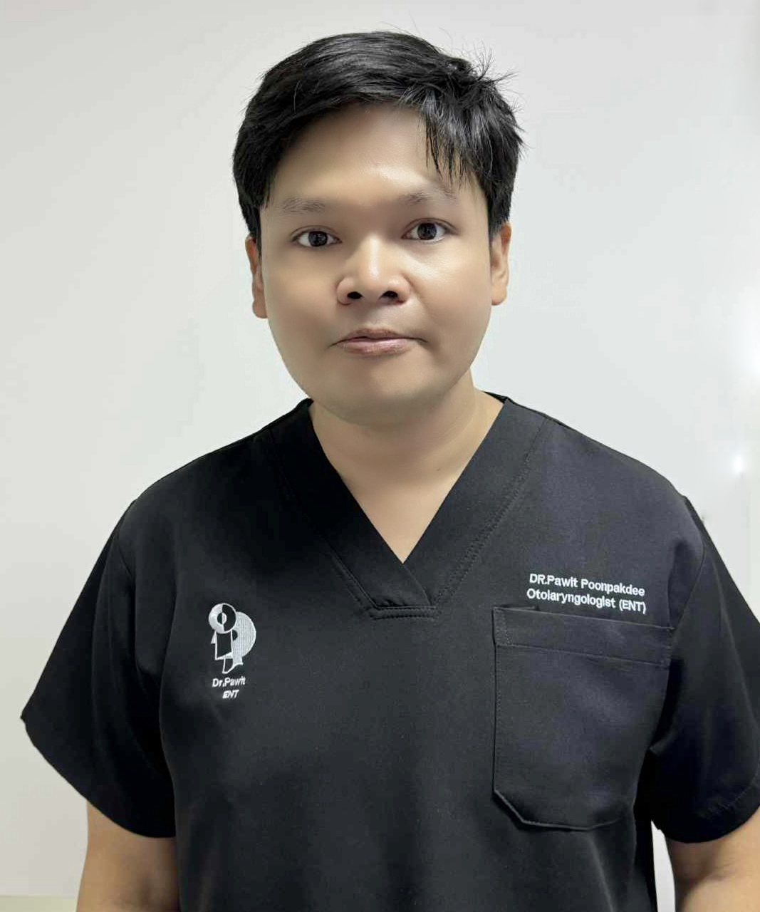 M.D. Pawit Poonpakdee 